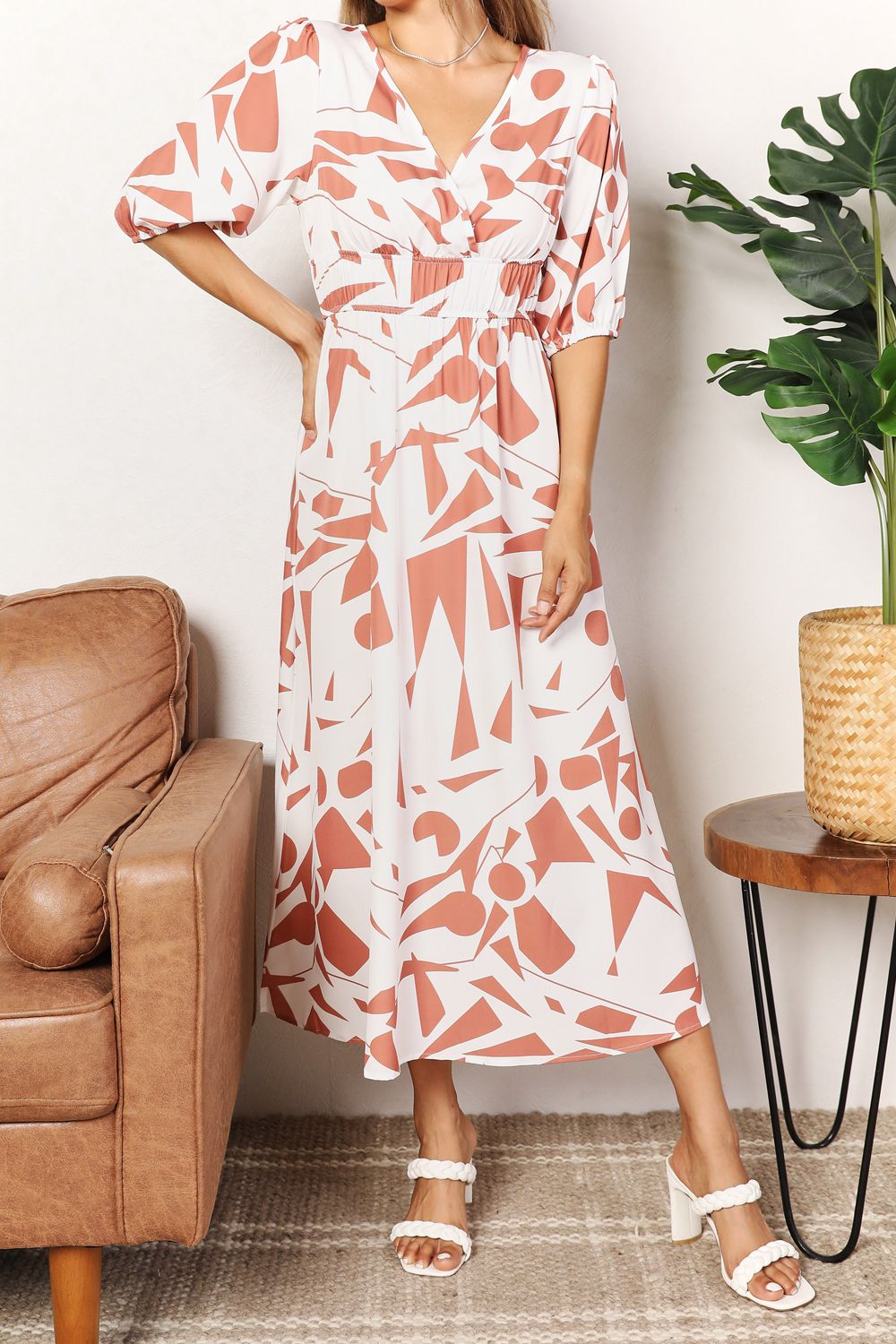 Printed surplice balloon sleeve midi dress in camel with pink floral print, front view