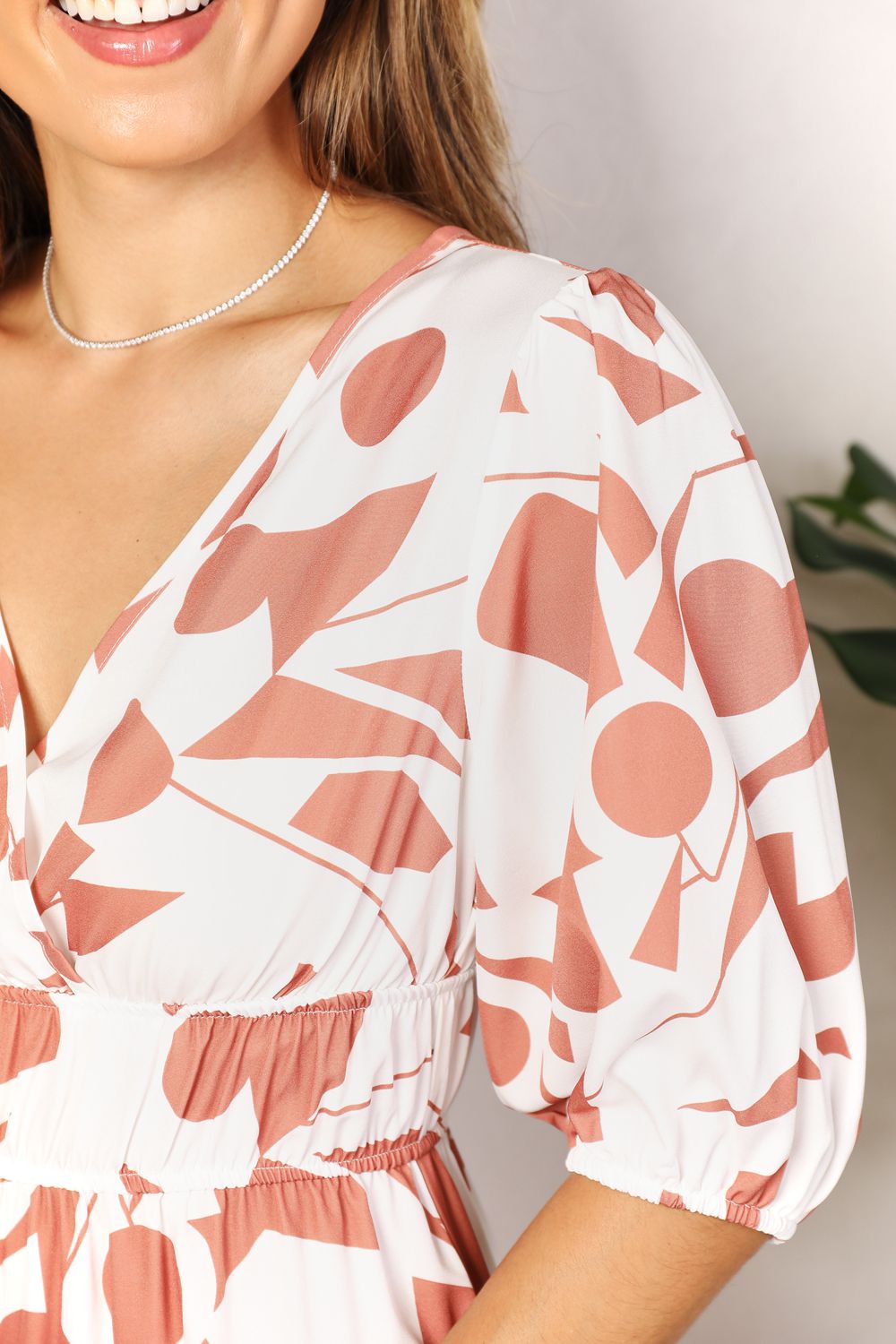Printed surplice balloon sleeve midi dress in camel with pink floral print, balloon sleeve detail