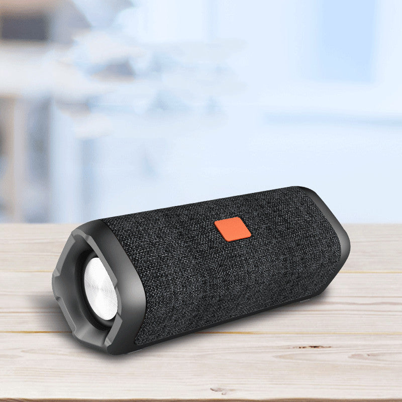 Fabric Waterproof Bluetooth Speaker — IPX4, TWS Stereo, 12H Battery & 20M Range — Eliza & Tuan